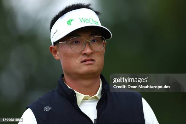 Haotong Li of China plays his second shot on the ninth hole during Day Two of the Dutch Open at Bernardus Golf on May 27, 2022 in Cromvoirt,...