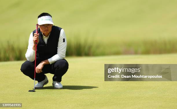 Haotong Li of China putts on the ninth green during Day Two of the Dutch Open at Bernardus Golf on May 27, 2022 in Cromvoirt, Netherlands.