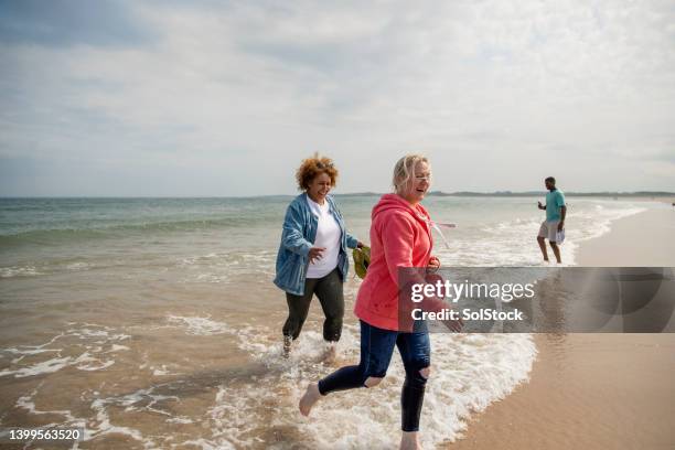 getting away from it all - uk beach stock pictures, royalty-free photos & images