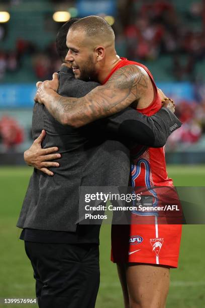 Lance Franklin of the Swans receives the Goodes-O'Loughlin medal from Michael O'Loughlin after winning the round 11 AFL match between the Sydney...