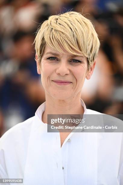 Marina Foïs attends the photocall for "As Bestas" during the 75th annual Cannes film festival at Palais des Festivals on May 27, 2022 in Cannes,...