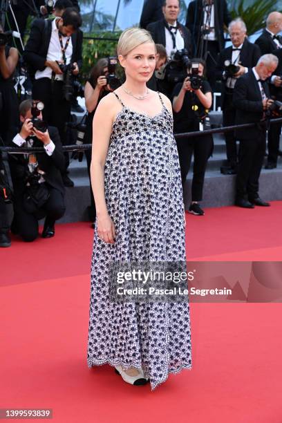 Michelle Williams departs after the screening of "Showing Up" during the 75th annual Cannes film festival at Palais des Festivals on May 27, 2022 in...