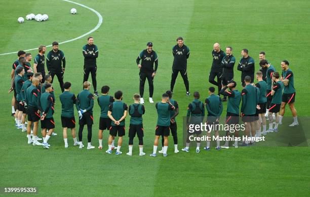 Juergen Klopp, Manager of Liverpool speaks to their team prior to the Liverpool FC Training Session at Stade de France on May 27, 2022 in Paris,...