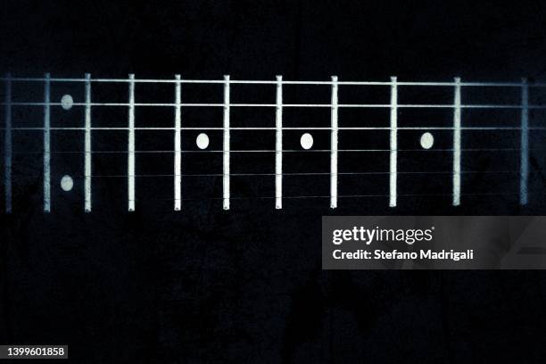 electric guitar handle on black background - electric guitar foto e immagini stock