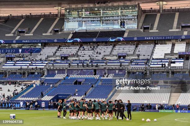 Jurgen Klopp manager of Liverpool talking with his team during a training before the UEFA Champions League Final at Stade de France on May 27, 2022...