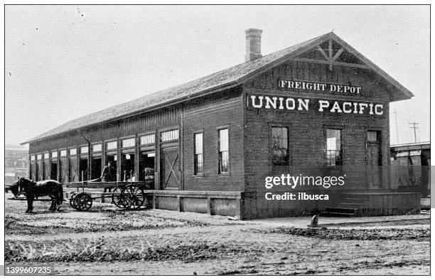 antique photograph from lawrence, kansas, in 1898: union pacific freight depot - railway station stock illustrations