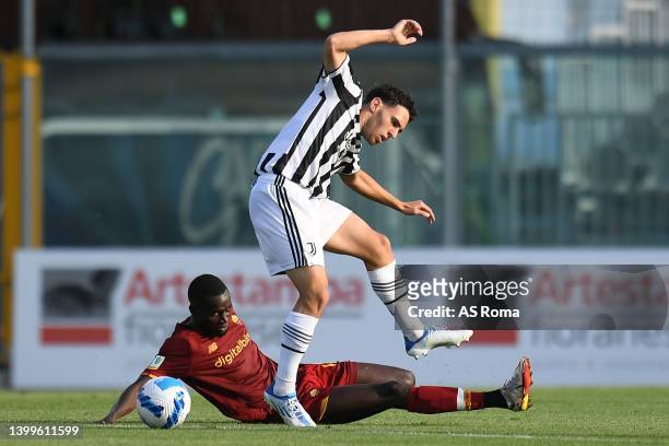 Maissa Codou Ndiaye of Roma U19 competes for the ball with Luis Hasa of Juventus U19 during the Primavera 1 Playoffs match between AS Roma and...