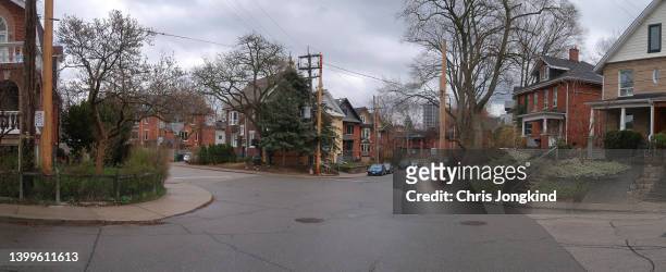 detached houses at an intersection in suburbia - toronto house stock pictures, royalty-free photos & images