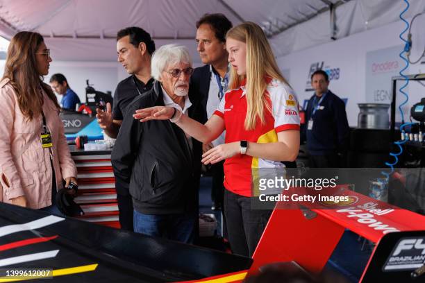 Bernie Ecclestone speaks with F4 driver Aurelia Nobels during a visit to the Velocitta racetrack for a Stock Car and Formula 4 race on May 15, 2022...