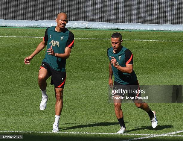 Fabinho of Liverpool with Thiago Alcantara of Liverpool during a training session at Stade de France on May 27, 2022 in Paris, France. Liverpool will...