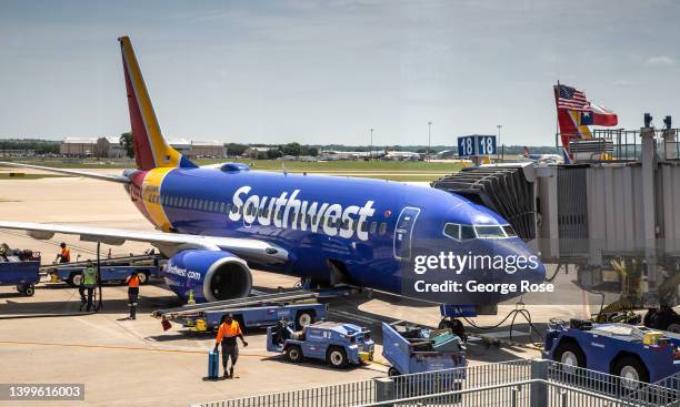 Southwest Airlines Boeing 737 passenger jet prepares to depart the gate on May 23 in Austin, Texas. Austin, the State Capitol of Texas, is the...