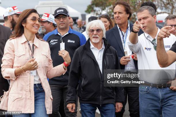 Bernie Ecclestone and his wife Fabiana Flosi during a visit to the Velocitta racetrack for a Stock Car and Formula 4 race on May 15, 2022 in Mogi...