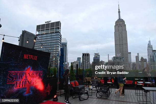 Signage and the Empire State Building are seen at the Stranger Things VIP Event at 230 5th Ave on May 26, 2022 in New York City.