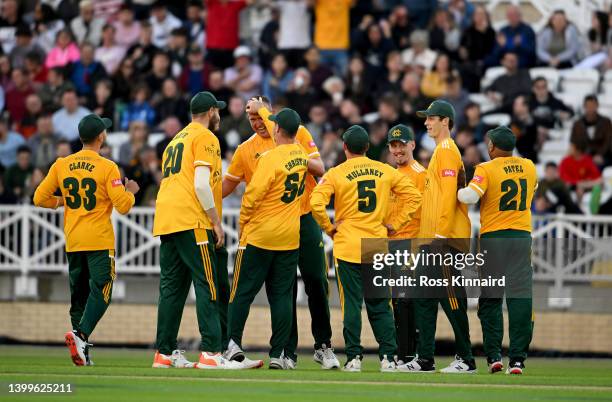 Luke Fletcher of Notts Outlaws is congratulated after taking five wickets during the Vitality T20 Blast game between Notts Outlaws and Worcestershire...