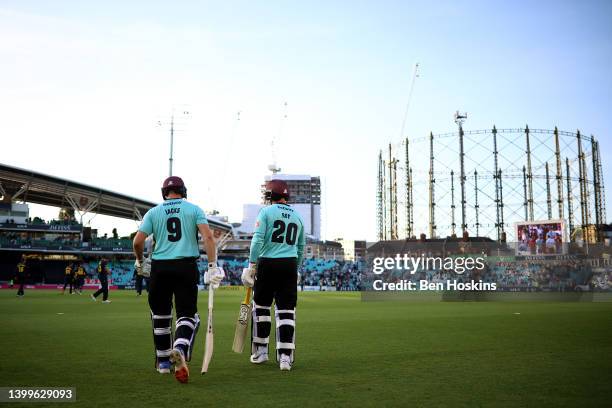 Will Jacks and Jason Roy of Surrey walk out to bat during the Vitality T20 Blast match between Surrey and Glamorgan at The Kia Oval on May 27, 2022...