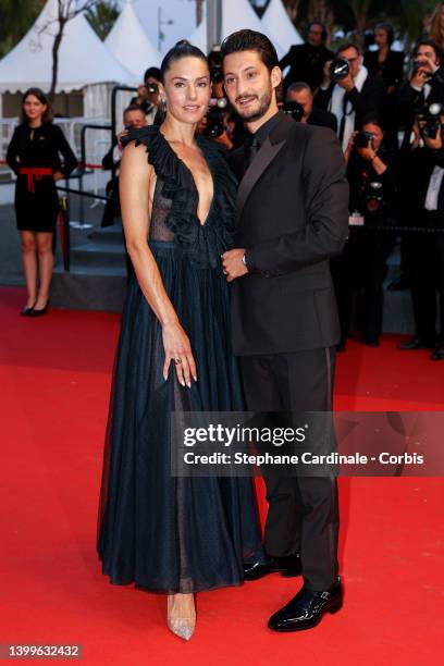 Natasha Andrews and Pierre Niney attend the screening of "Mascarade" during the 75th annual Cannes film festival at Palais des Festivals on May 27,...