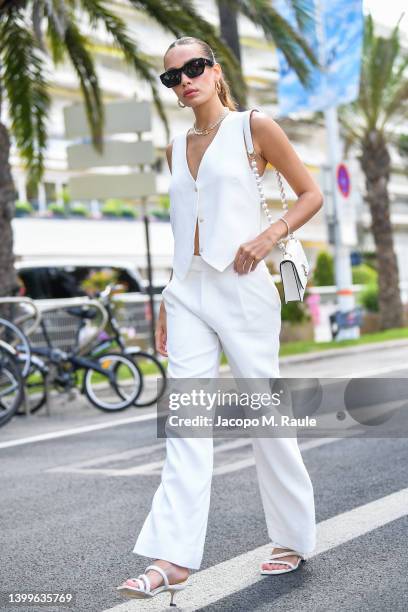 Hana Cross is seen posing during the 75th annual Cannes film festival at on May 26, 2022 in Cannes, France.