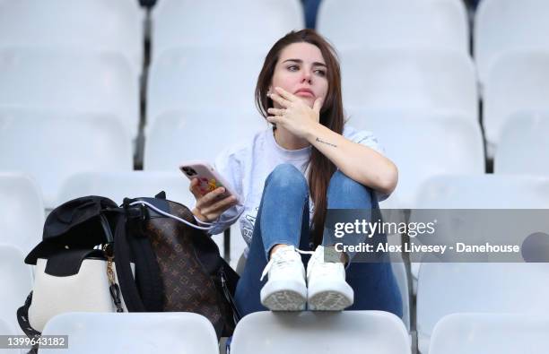 Mina Bonino the partner of Federico Valverde of Real Madrid looks on during an open training session at Stade de France on May 27, 2022 in Paris,...