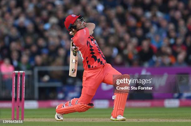 Lightning batsman Liam Livingstone hits a six during the Vitality T20 Blast match between Lancashire Lightning and Yorkshire Vikings at Emirates Old...