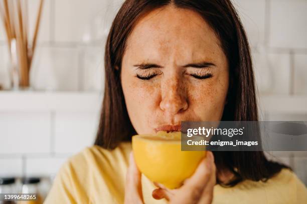 this is so sour - lemon stockfoto's en -beelden