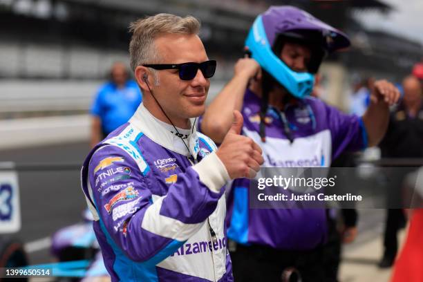 Ed Carpenter of the USA and Ed Carpenter Racing gives a thumbs up to the fans during the 2022 Indianapolis 500 Carb Day at Indianapolis Motor...