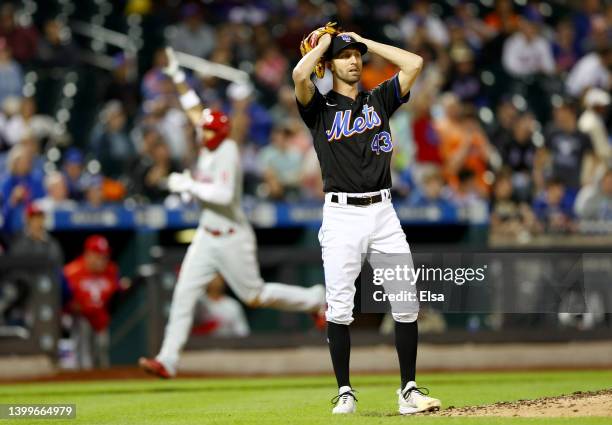 Chasen Shreve of the New York Mets reacts after giving up a three run home run in the sixth inning to Garrett Stubbs of the Philadelphia Phillies as...