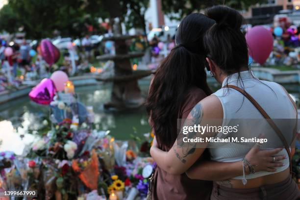 People visit memorials for victims of the May 24th mass shooting on May 27, 2022 in Uvalde, Texas. 19 children and two adults were killed on Tuesday...