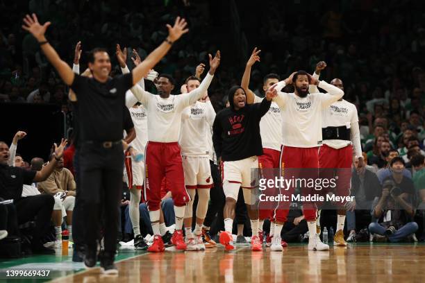 Members of Miami Heat bench react against the Boston Celtics during the second quarter in Game Six of the 2022 NBA Playoffs Eastern Conference Finals...