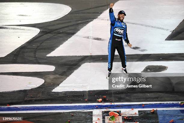 Ross Chastain, driver of the Worldwide Express Chevrolet, celebrates in victory lane after winning the NASCAR Camping World Truck Series North...