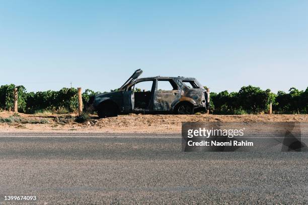 abandoned roadside car wreck - australian vinyards stock-fotos und bilder
