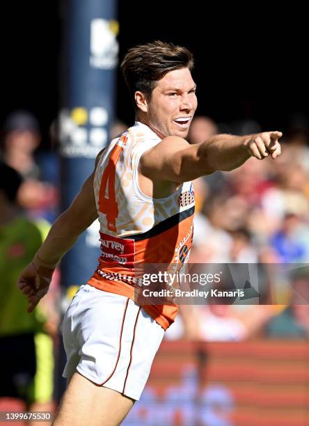 Toby Greene of the Giants celebrates after kicking a goal during the round 11 AFL match between the Brisbane Lions and the Greater Western Sydney...