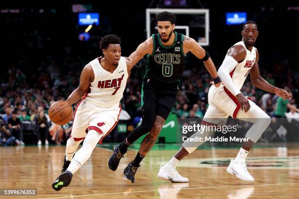 Kyle Lowry of the Miami Heat dribbles past Jayson Tatum of the Boston Celtics during the third quarter of Game Six of the 2022 NBA Playoffs Eastern...