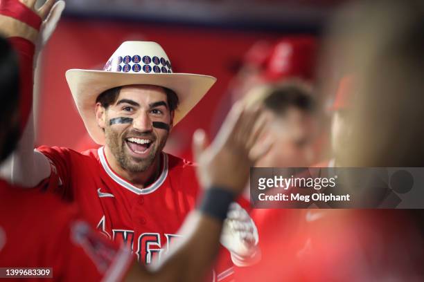 Tyler Wade of the Los Angeles Angels reacts in the dugout after hitting a home run in the fifth inning against the Toronto Blue Jays at Angel Stadium...