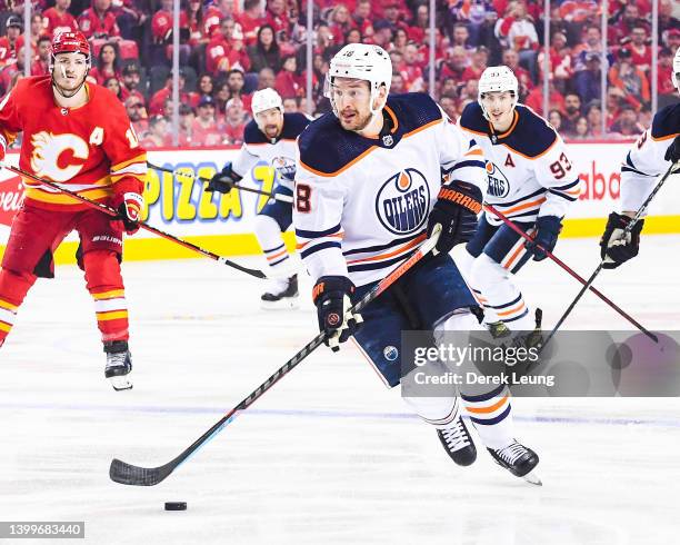 Zach Hyman of the Edmonton Oilers in action against the Calgary Flames during Game Five of the Second Round of the 2022 Stanley Cup Playoffs at...