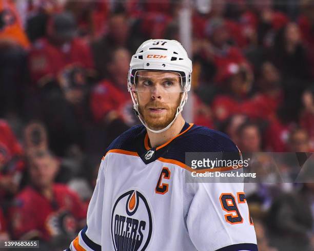 Connor McDavid of the Edmonton Oilers in action against the Calgary Flames during Game Five of the Second Round of the 2022 Stanley Cup Playoffs at...