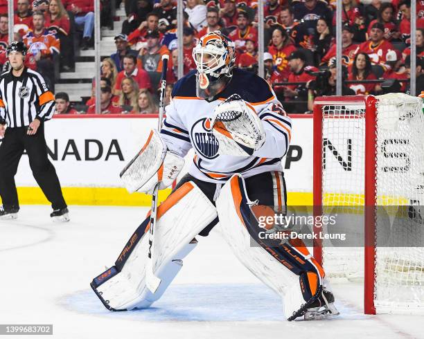 Mike Smith of the Edmonton Oilers in action against the Calgary Flames during Game Five of the Second Round of the 2022 Stanley Cup Playoffs at...