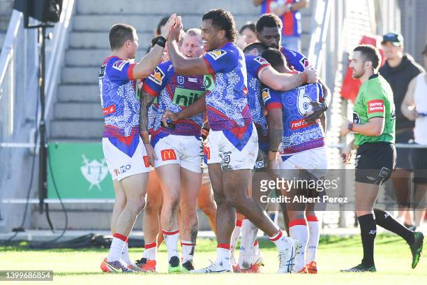 Knights celebrate a Edrick Lee try during the round 12 NRL match between the New Zealand Warriors and the Newcastle Knights at Moreton Daily Stadium,...