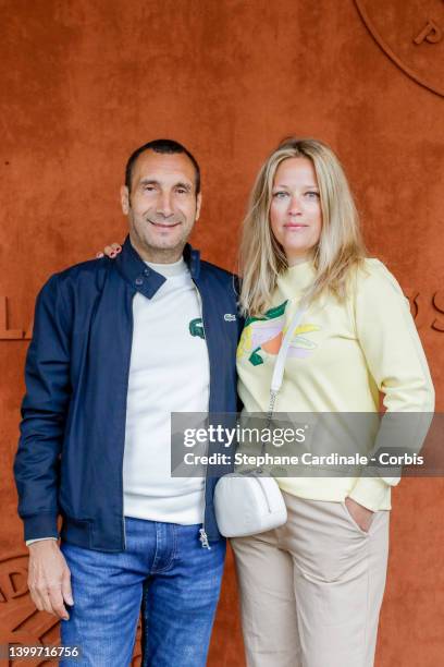Zinedine Soualem and Caroline Faindt at Roland Garros on May 27, 2022 in Paris, France.