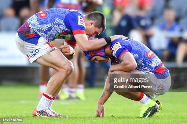 Jake Clifford and Kalyn Ponga of the Knights celebrate victory during the round 12 NRL match between the New Zealand Warriors and the Newcastle...