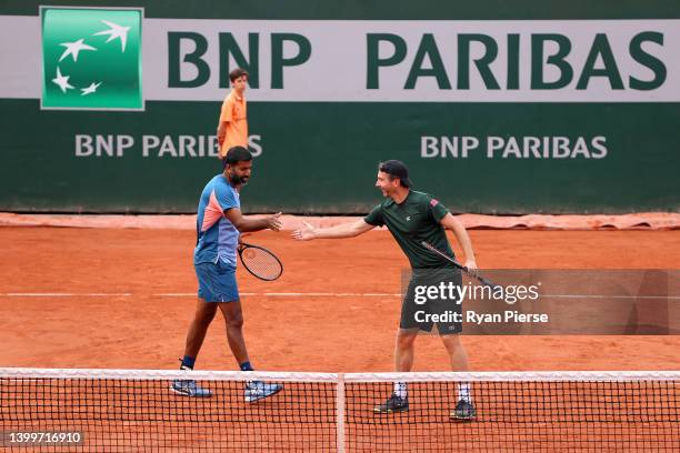 Rohan Bopanna of India and partner Matwe Middelkoop of Netherlands shake hands against Nikola Mektic of Croatia and partner Mate Pavic of Croatia...