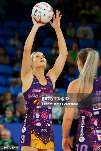 Gretel Bueta of the Firebirds shoots the ball during her warm up before the round 12 Super Netball match between West Coast Fever and Queensland...