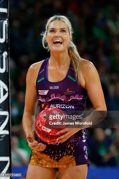 Gretel Bueta of the Firebirds reacts as she prepares to take a shot during the round 12 Super Netball match between West Coast Fever and Queensland...