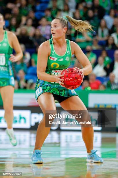 Alice Teague-Neeld of the fever looks for a passing option during the round 12 Super Netball match between West Coast Fever and Queensland Firebirds...