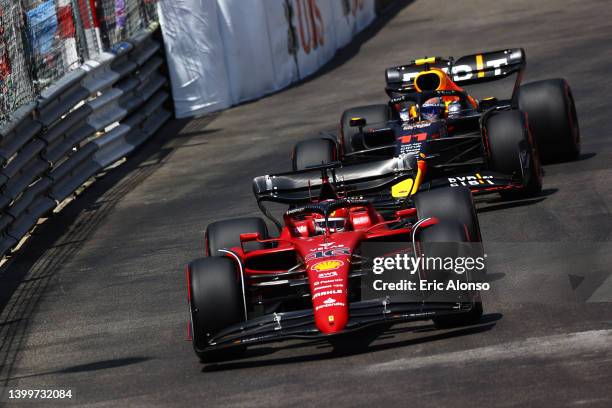 Charles Leclerc of Monaco driving the Ferrari F1-75 leads Sergio Perez of Mexico driving the Oracle Red Bull Racing RB18 during final practice ahead...