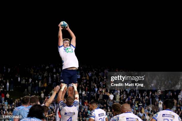 Taine Plumtree of the Blues jumps at the lineout during the round 15 Super Rugby Pacific match between the NSW Waratahs and the Blues at Leichhardt...