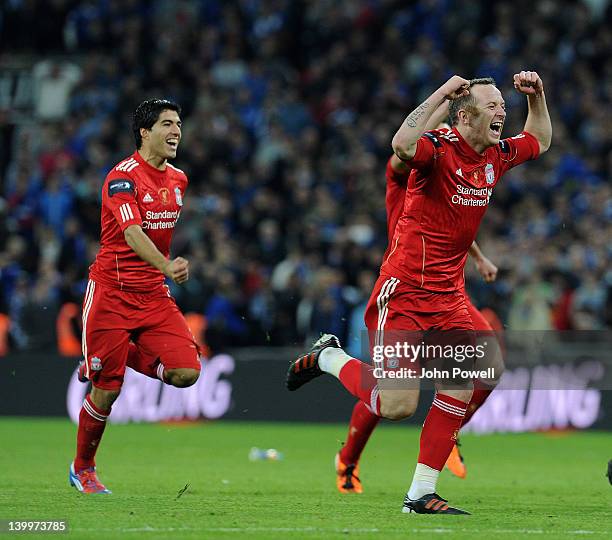 Luis Suarez and Charlie Adam of Liverpool celebrate their win during the Carling Cup Final match between Liverpool and Cardiff City at Wembley...