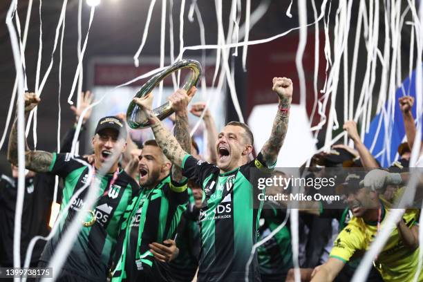 Alessandro Diamanti of Western United lifts the trophy as he celebrates with teammates after winning the A-League Mens Grand Final match between...