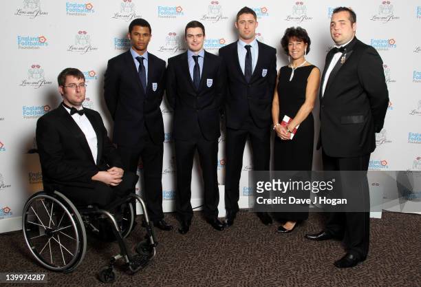 Steve Palmer, Frazer Campbell, Adam Johnson, Gary Cahill, Stephanie Moore and Simon Brown attend The England Footballers Foundation Lions and Roses...