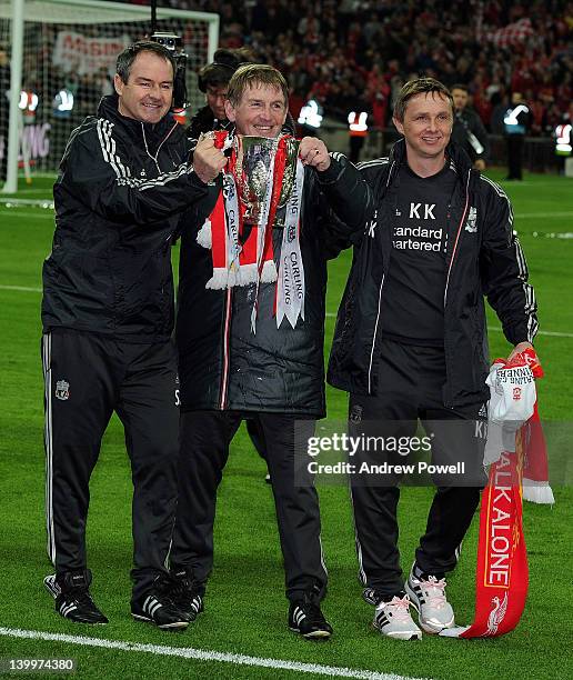 Steve Clarke, Kenny Dalglish and Kevin Keen of Liverpool celebrate with the trophy at the end of the Carling Cup Final match between Liverpool and...