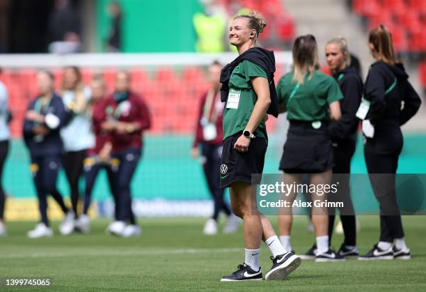 Alexandra Popp of VfL Wolfsburg inspects the pitch prior to the Women's DFB Cup final match between VfL Wolfsburg and Turbine Potsdam at...